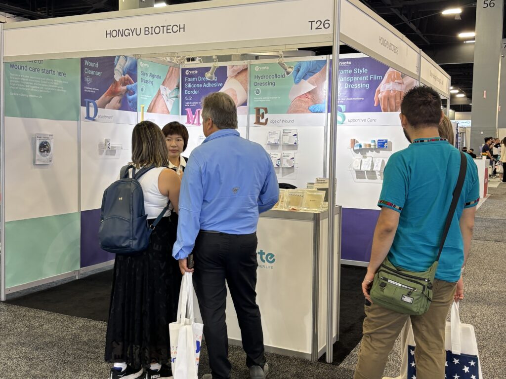 Conkote team engaging in a product discussion with healthcare professionals at WHX Miami 2025