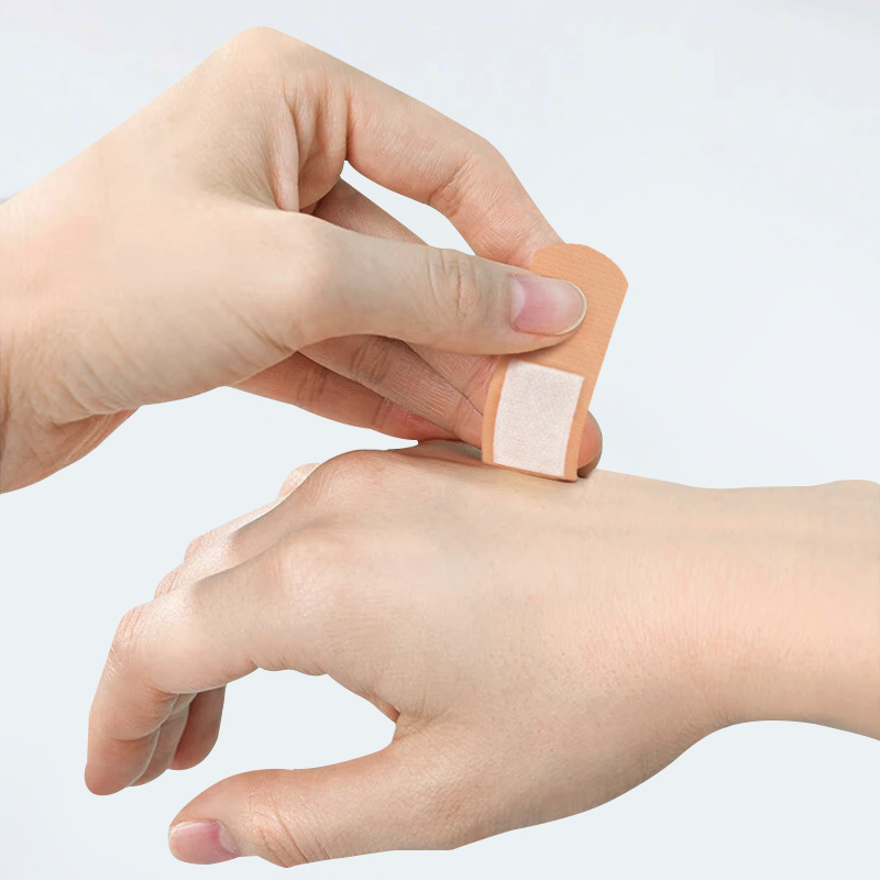 PE Woundplast being removed from skin gently and painlessly