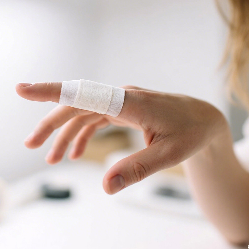 Close-up of Paper Tape being applied on delicate skin without redness