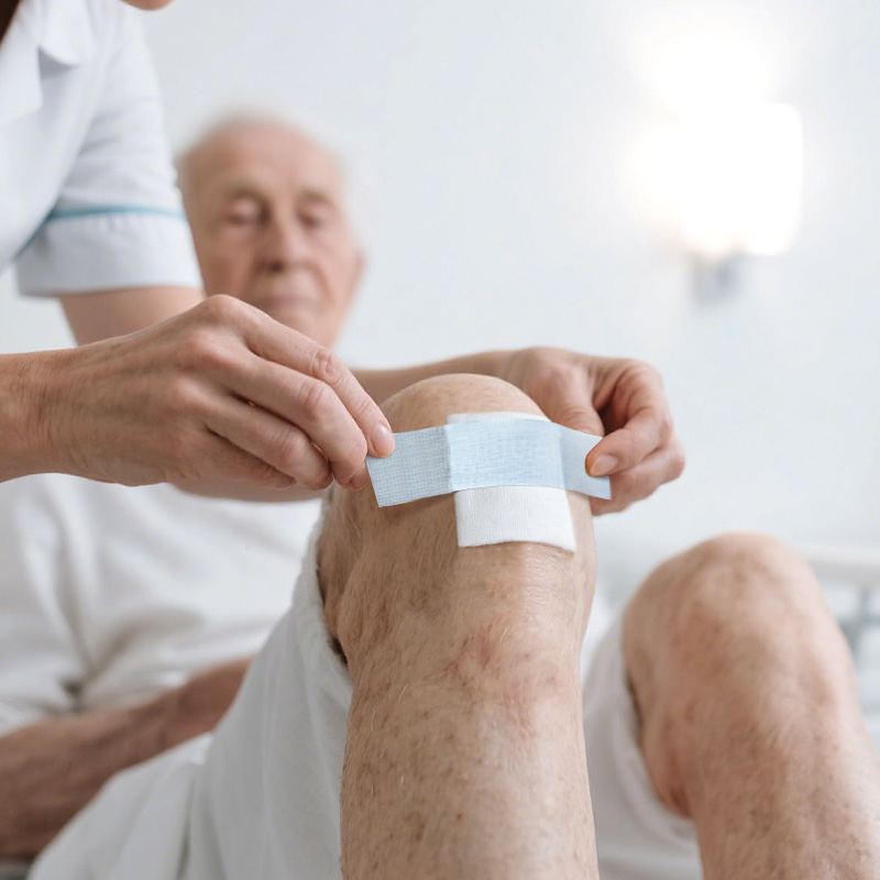 Packaging of Kind Removal Silicone Non-Woven Tape Premium in blue with plus-minus easy tear marks