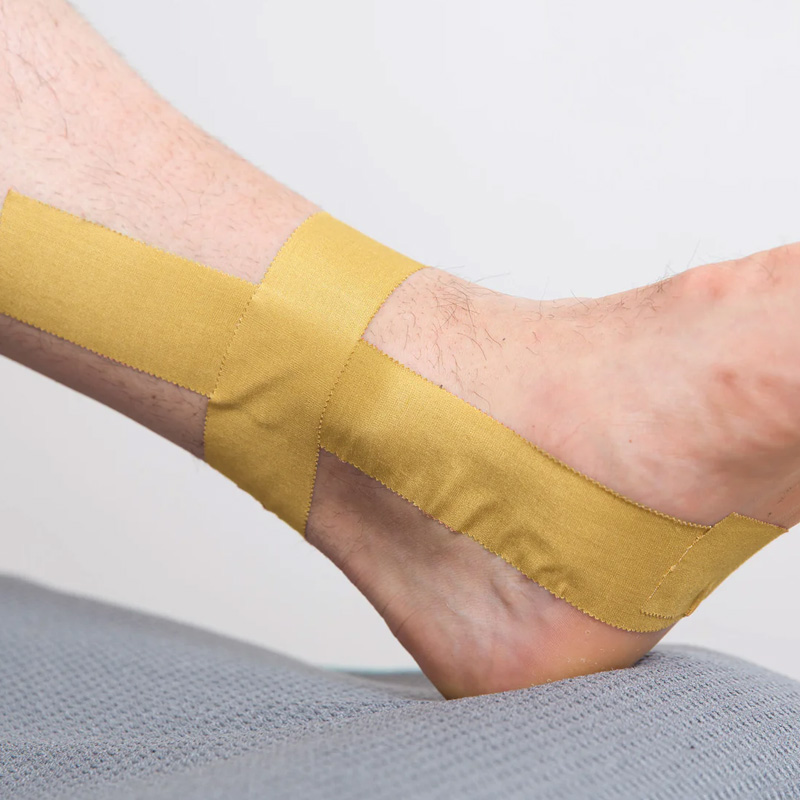 Zinc Oxide Tape wrapped around wrist or joint, showing stiff supportive hold