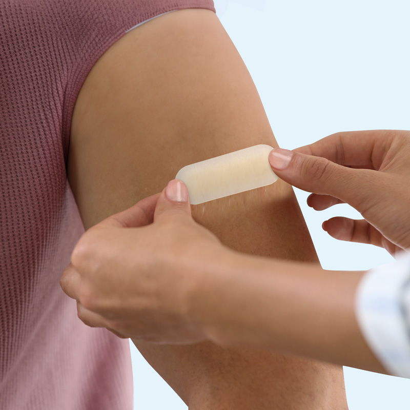 Hydrocolloid Gel Bandage shown on skin with arrows indicating moisture retention and healing