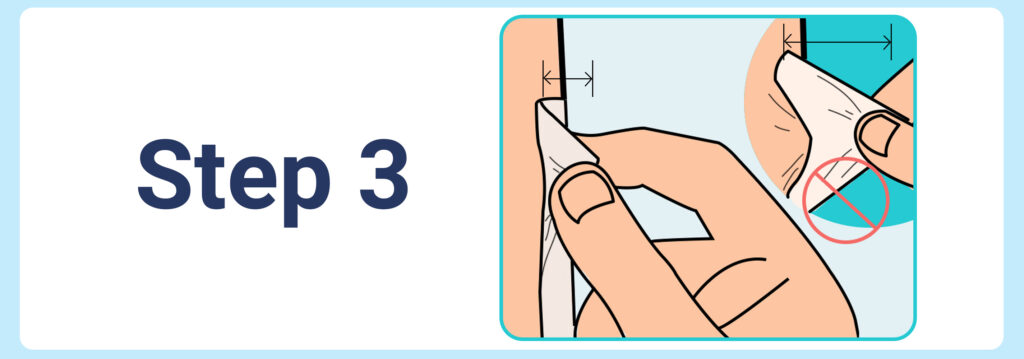 Peeling medical tape close to the skin to reduce irritation