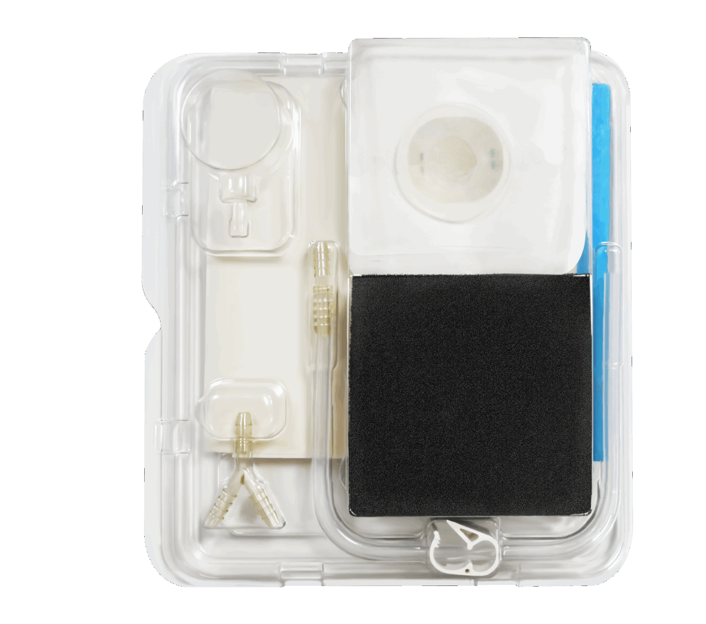 Conkote V.A.C. Dressing Kit showing foam dressing, transparent adhesive film, and suction components