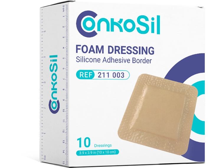 Silicone foam dressing applied to a burn wound to manage exudate and protect fragile tissue during healing.